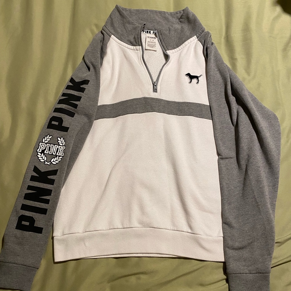 Pink half zip. Size medium.